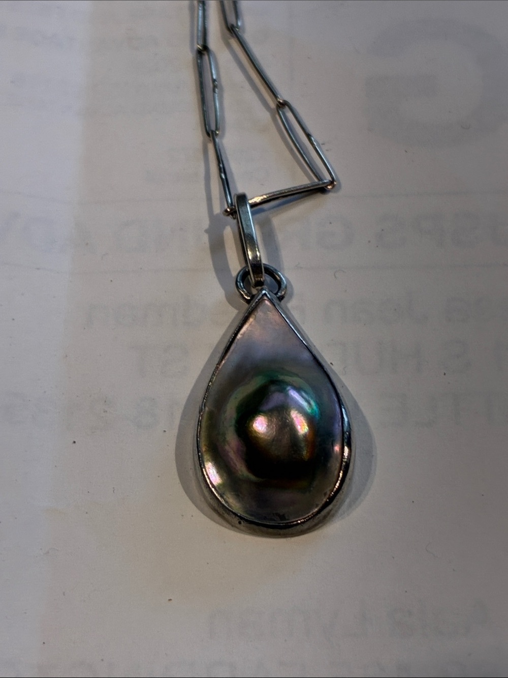 Sterling Silver Teardrop Pendant with Mabe Pearl.   Marked ‘900’ Chain